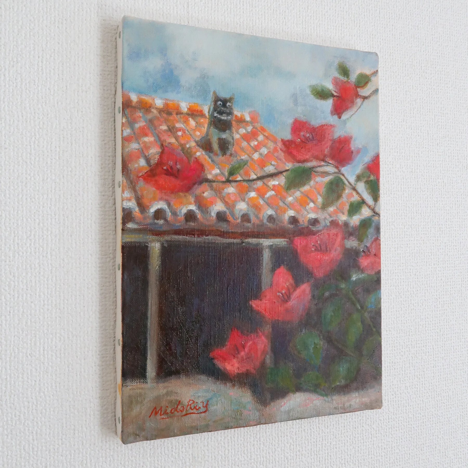 ブーゲンビリアとシーサー(石垣・武富島)